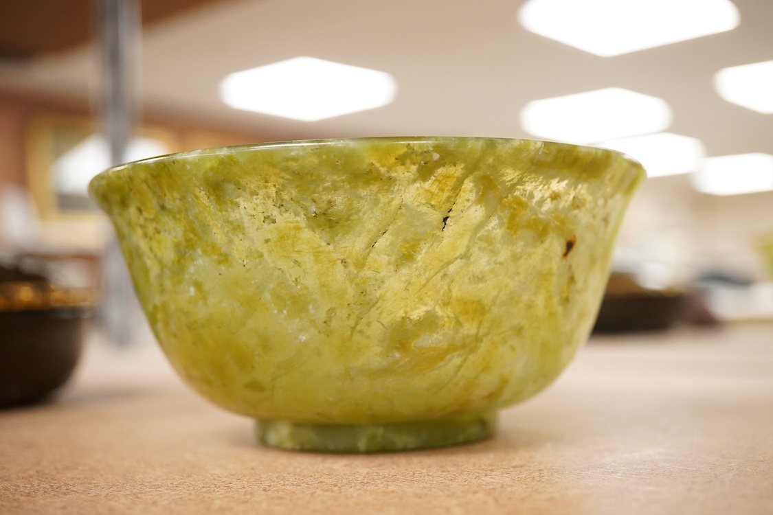 A Chinese bowenite jade bowl and a green quartz egg paperweight, 13cm